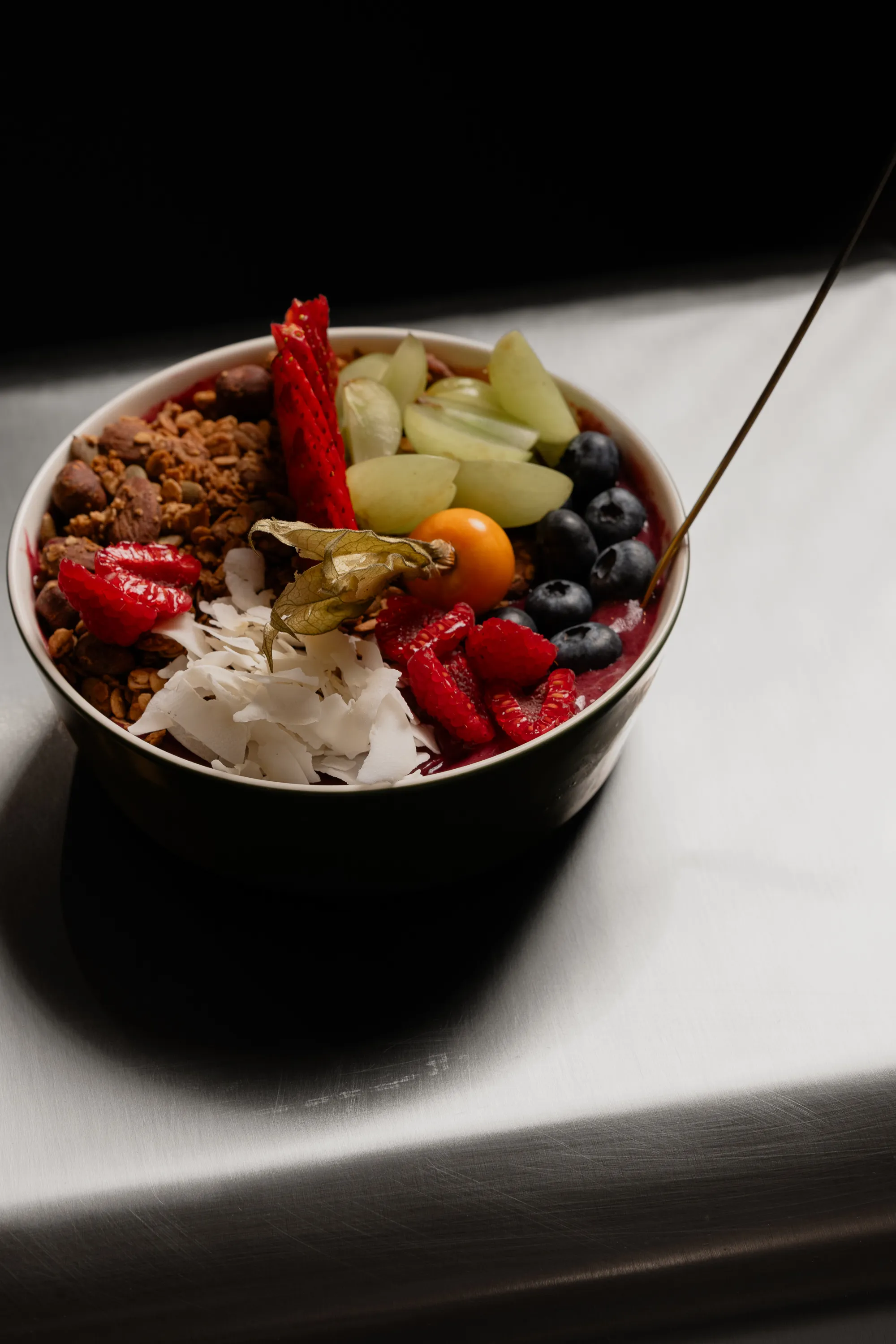 Breakfast bowl with yogurt, granola and fruit