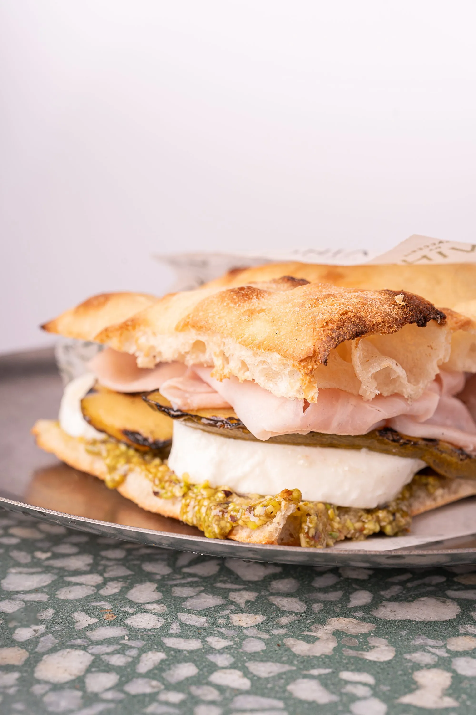 Focaccia with cooked ham and fior di latte mozzarella