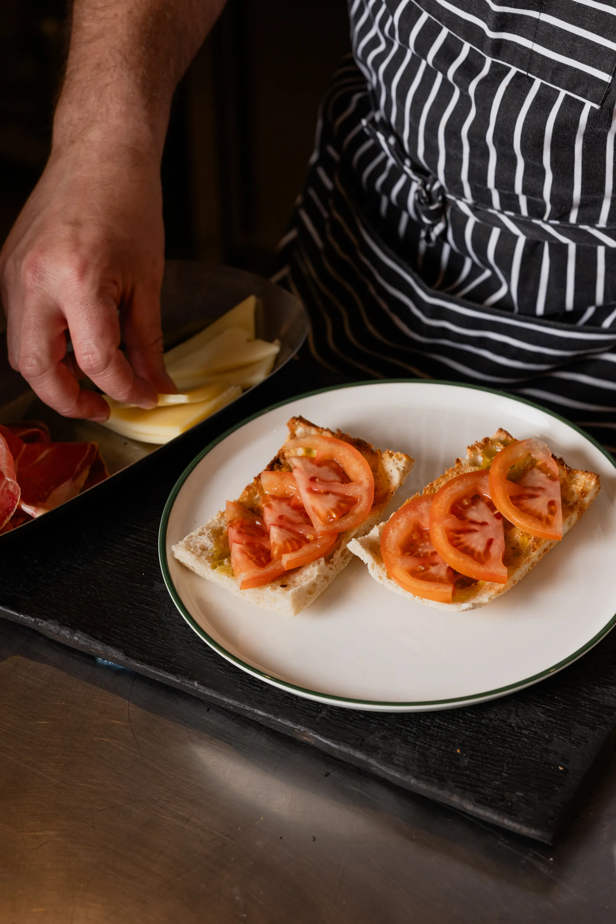 Focaccia with tomato and serrano ham